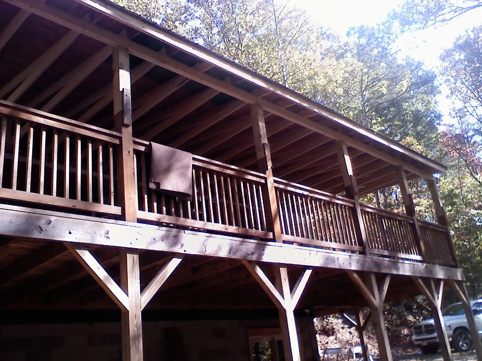 Timber framing under a new elevated porch and deck — Roof Leak Repair in Stokes by Roofing Brothers